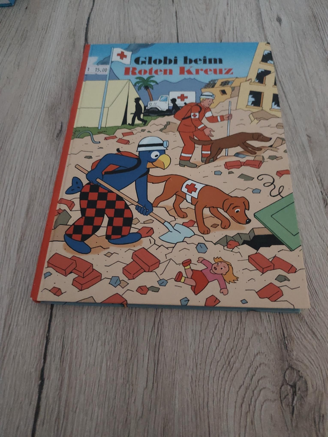 Globi bein roten Kreuz